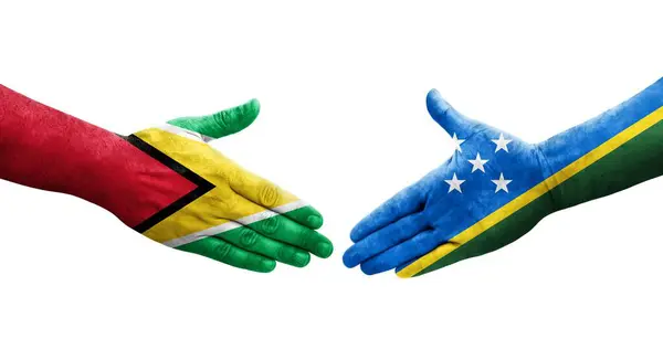Aperto Mão Entre Ilhas Salomão Bandeiras Guiana Pintadas Mãos Imagem — Fotografia de Stock