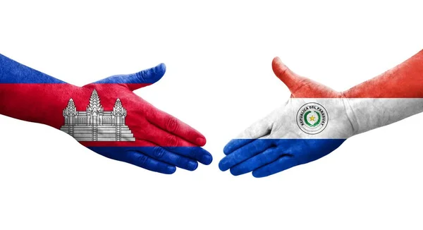 Handdruk Tussen Paraguay Cambodja Vlaggen Geschilderd Handen Geïsoleerd Transparant Beeld — Stockfoto