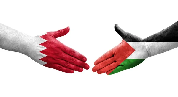 Handdruk Tussen Palestijnse Bahreinse Vlaggen Handen Geschilderd Geïsoleerd Transparant Beeld — Stockfoto