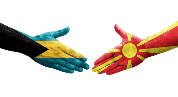 Рукостискання Між Північною Македонією Багамськими Прапорами Намальоване Руках Ізольоване Прозоре — стокове фото