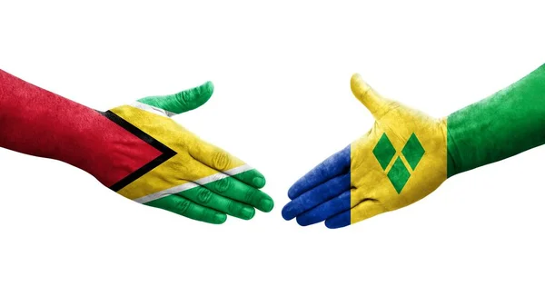 Poignée Main Entre Saint Vincent Grenadines Guyane Drapeaux Peints Sur — Photo