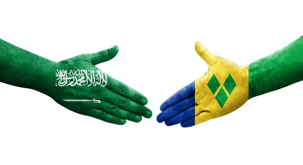 Uścisk Dłoni Między Flagami Saint Vincent Grenadines Arabii Saudyjskiej Namalowanymi — Zdjęcie stockowe