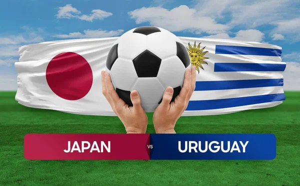 stock image Japan vs Uruguay national teams soccer football match competition concept.