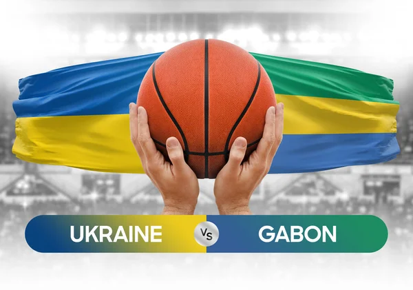 Ukrayna Gabon milli basketbol takımlarına karşı basketbol topu yarışma kupası konsepti