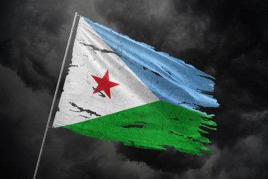 Cibuti koyu gökyüzü arkaplanındaki bayrağı yırttı.