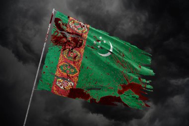 Turkmenistan torn flag on dark sky background with blood stains. clipart