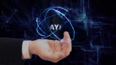 Boyalı el, konsept hologram Oynatıcı 'yı gösteriyor. Gelecekteki teknoloji ekranı ve modern kozmik geçmişi olan takım elbiseli bir adam.