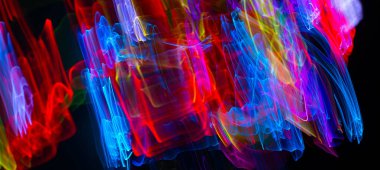 Colorful abstract line light art. Conceptual art showing motion, pulse of the city of Helsinki & darkness of the night. Created by moving camera with long exposure in the city during night