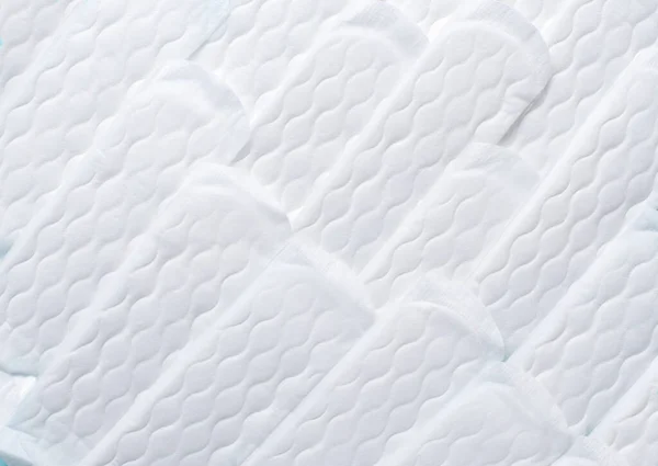 Pattern of Sanitary pad, Sanitary napkin background. Menstruation, Feminine hygiene, top view.