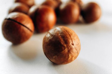 Macadamia nut on white background, Roasted Macadamia nut on White Background With work path. clipart