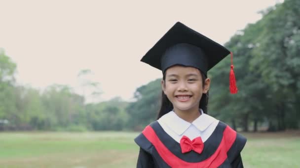 Educational Concept Resolution Asian Girl Confidently Holding Diploma Graduation Day — Stock Video