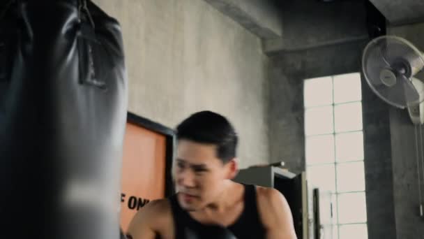 Fitness Concept Resolution Young Asian Man Punching Gym — Stock Video