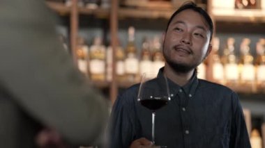 Night club concept of 4k Resolution. Asian business men having a meeting in a restaurant. A group of specialized clubs that sell alcoholic beverages.