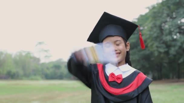 Educational Concept Resolution Asian Girl Confidently Holding Diploma Graduation Day — Vídeo de Stock
