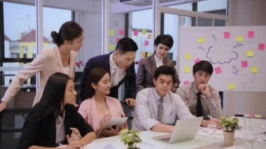 Business concept of 4k Resolution. Group of Asian businessmen working together in the office.