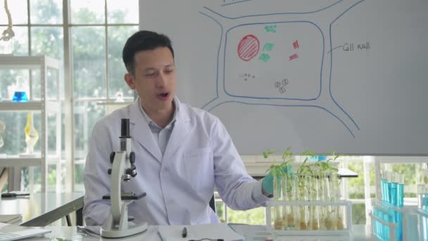 Research Concept Resolution Asian Male Scientist Interviewing Lab Workflow — Stock Video