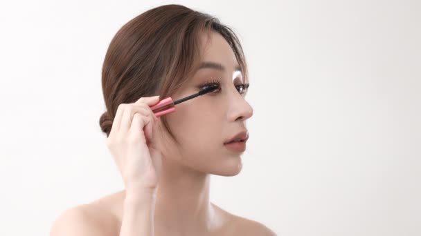 Beauty Concept Resolution Asian Woman Brushing Eyelashes White Background — Stock Video