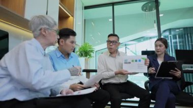 Business concept of 4k Resolution. Asian young business people group have discussion meeting in office.