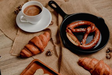 Breakfast with coffee and croissant. clipart