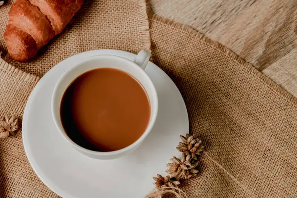 stock image Breakfast with coffee and croissant.