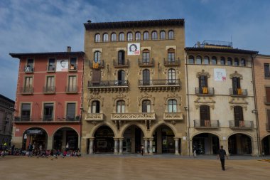 Old houses in the main square of the small Catalan town of Vic, in Spain