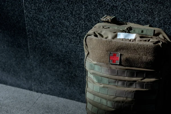 Close-up of a combat medics backpack with space for text. High quality photo