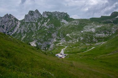 Mala Spice Cime Verdi peaks on Mangart saddle, Slovenia's Highest Panoramic Road, heavy clouds before summer rain