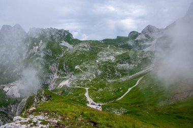 Mala Spice Cime Verdi peaks on Mangart saddle, Slovenia's Highest Panoramic Road, heavy clouds before summer rain
