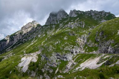 Mala Spice Cime Verdi peaks on Mangart saddle, Slovenia's Highest Panoramic Road, heavy clouds before summer rain