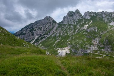 Mala Spice Cime Verdi peaks on Mangart saddle, Slovenia's Highest Panoramic Road, heavy clouds before summer rain