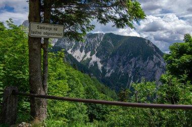 Ljubelj pass in Karawanks chain of Slovenia with a old passageway border between Slovenia and Austria, amazing nature around clipart