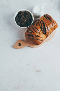 Traditional Romanian sweet bread cozonac decorated bloom. Easter baking sourdough. Healthy food. top view. space for text. High quality photo