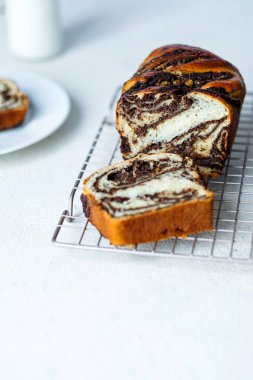 Homemade traditional pastry with creamy poppy seed filling. Easter European baking dessert. Sweet sourdough bread. Healthy food. High quality photo