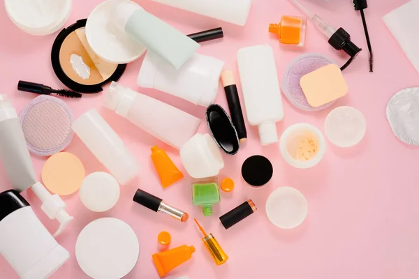 stock image Used plastic packaging for cosmetics on a pink background. Manage waste. flat lay, top view. High quality photo