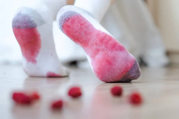 A dirty socks stains from crushed berries. daily life stain concept. High quality photo