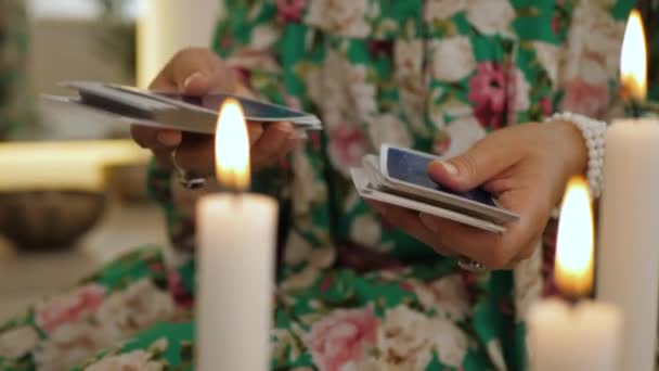 Crystal Watcher Hands Shuffling Tarot Cards Candlelight Fortune Teller Ritual — Stock Video