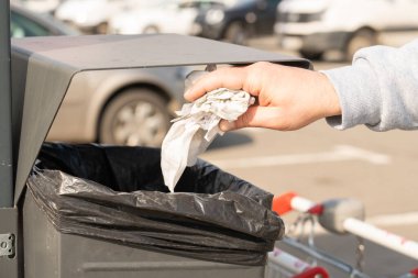 Close-up of metallic grey garbage container from urban place as clean town concept