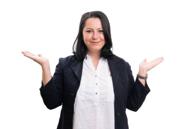 Smiling businesswoman with friendly trustworthy expression holding blank copyspace in palms as presenting corporate entrepreneur concept isolated on white