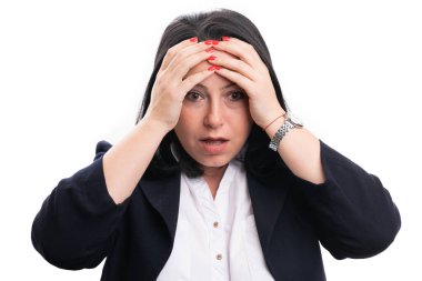 Confused female entrepreneur model making shocked amazed surprised gesture touching forehead with hands and expression isolated on white background