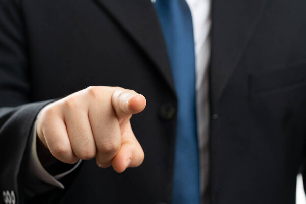 Close-up of adult corporate man entrepreneur business executive wearing casual suit touching transparent display or screen blank copyspace isolated on studio background