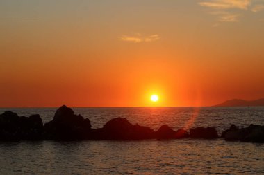 A romantic sunset over Mediterranean Sea near Naples, Italy