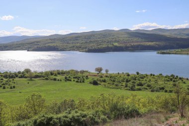 Picturesque spring landscape view of Pchelina Dam in Bulgaria clipart