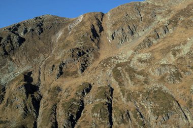 Mountain landscape in late autumn in the Carpathian Mountains, Romania. Fagaras. Tourist and geological landmark. Autumn landscape in high mountains.