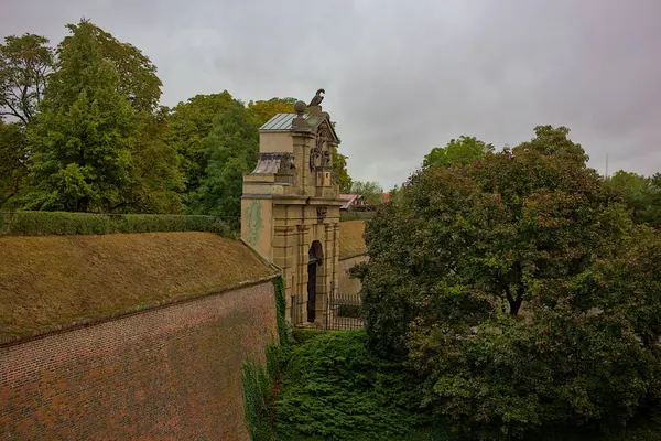 Leopold Stone Gate on Vysehrad is a Baroque gate of the Prague fortification. Side view of a fragment of an ancient wall and the entrance to the fortress, built in 1653-1672.