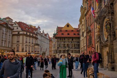 Prague, Czech Republic - October 7, 2023: Old Town Square with tourists, historical square in the center of Prague. The colorful old buildings and astronomical clock are very popular among tourists. clipart