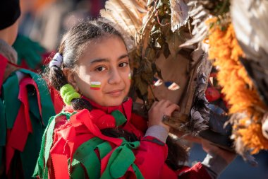 Sofia, Bulgaria - January 08, 2023: Unidentified woman in traditional kuker costume at the Surva masquerade games festival in Sofia, Bulgaria. Kuker costume at the masquerade games in Sofia, Bulgaria