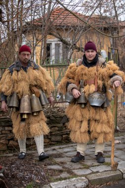 Breznik, Bulgaria - January 21, 2023: Masquerade festival in Breznik Bulgaria. People with a mask called Kukeri dance and perform to scare the evil spirits. The photo was taken on January 21th, 2023