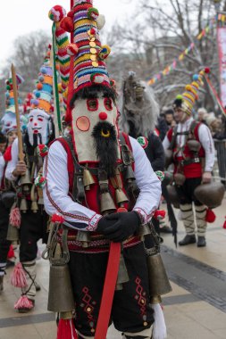 Pernik, Bulgaria - January 28, 2023: Masquerade festival in Pernik Bulgaria. People with a mask called Kukeri dance and perform to scare the evil spirits. The photo was taken on January 28th, 2023