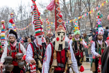 Pernik, Bulgaria - January 28, 2023: Masquerade festival in Pernik Bulgaria. People with a mask called Kukeri dance and perform to scare the evil spirits. The photo was taken on January 28th, 2023