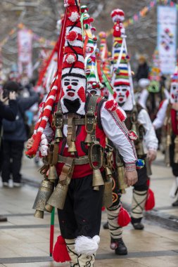 Pernik, Bulgaria - January 28, 2023: Masquerade festival in Pernik Bulgaria. People with a mask called Kukeri dance and perform to scare the evil spirits. The photo was taken on January 28th, 2023